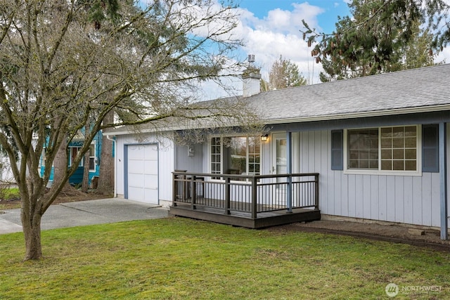 ranch-style home featuring driveway, a chimney, a front yard, and a shingled roof