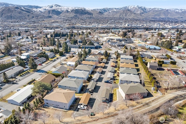 bird's eye view with a residential view and a mountain view