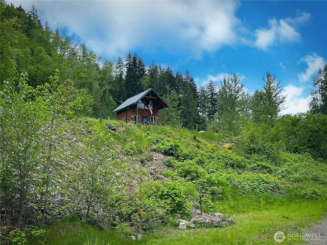 view of landscape featuring a view of trees