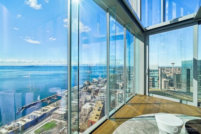 balcony with a city view and a water view