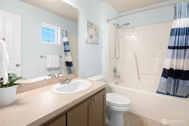 bathroom featuring vanity, toilet, and shower / tub combo