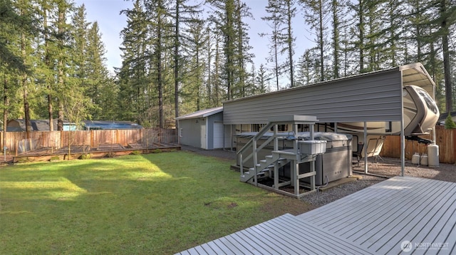 view of yard with a deck and fence