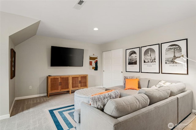 carpeted living room with recessed lighting, visible vents, and baseboards