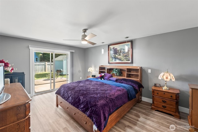 bedroom featuring baseboards, ceiling fan, light wood-type flooring, and access to exterior