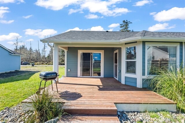 deck featuring a yard