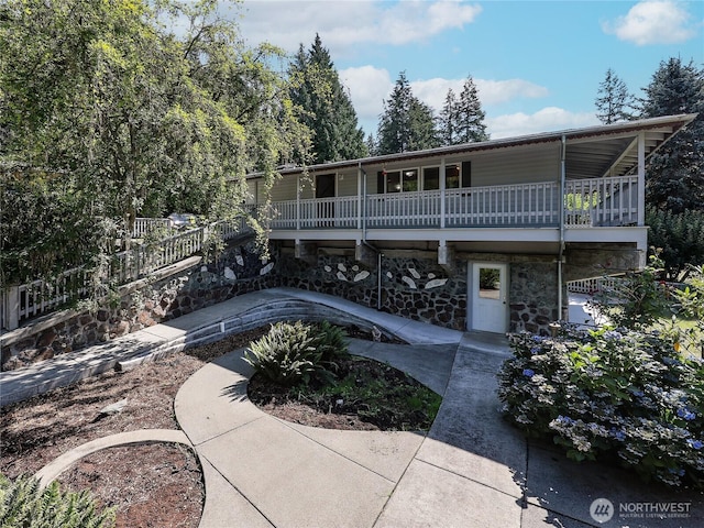 view of front of house with stone siding