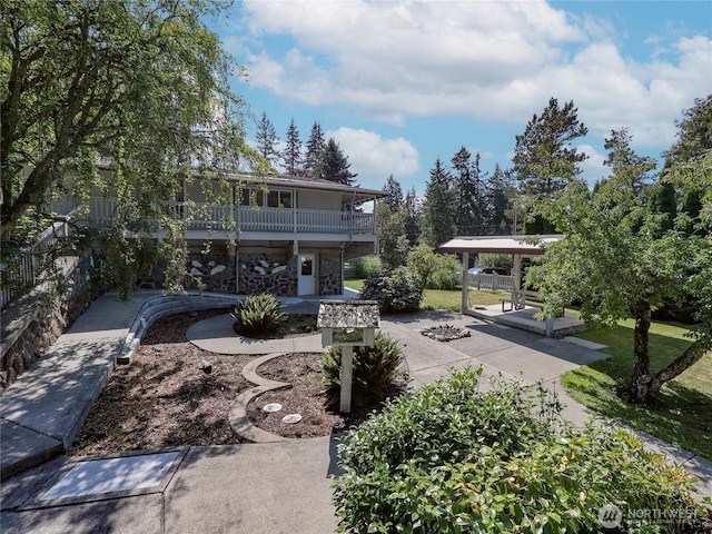 view of home's community with a patio