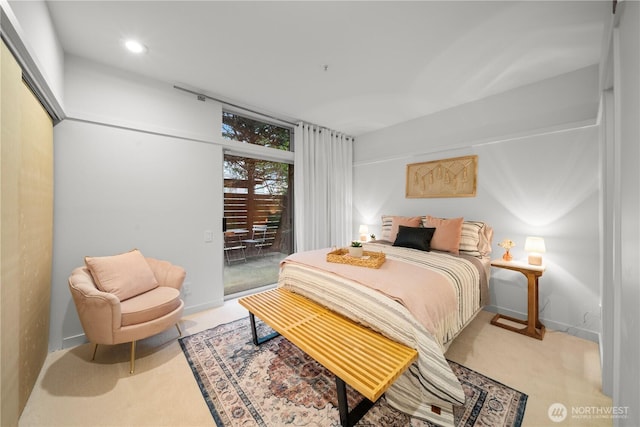 bedroom featuring access to outside, recessed lighting, light colored carpet, and baseboards