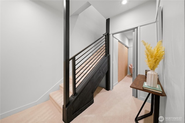 stairs with recessed lighting, carpet, and baseboards