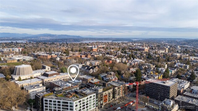 bird's eye view featuring a city view and a mountain view