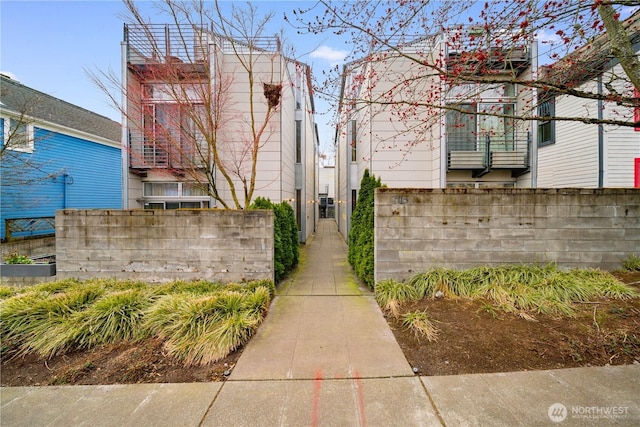 exterior space with a fenced front yard