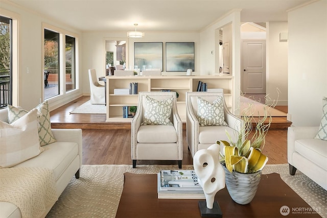 living room with wood finished floors and baseboards