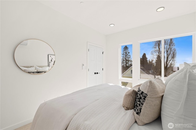 bedroom with baseboards and recessed lighting