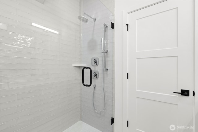 full bathroom featuring a stall shower