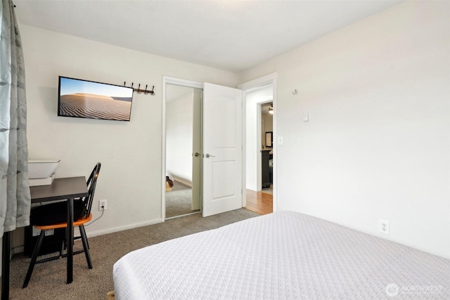 carpeted bedroom with a closet