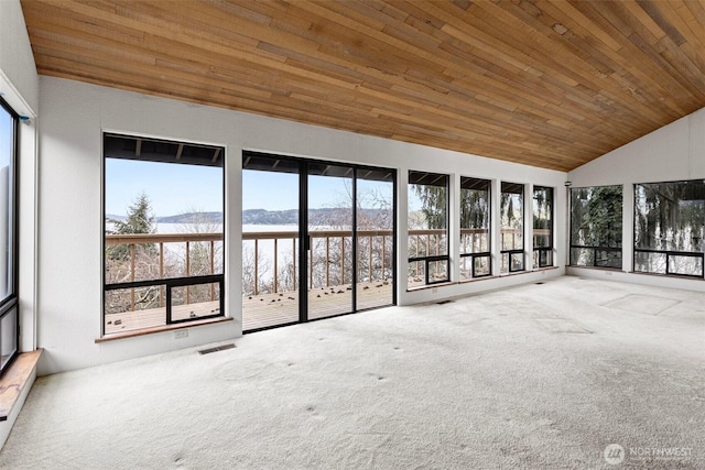 unfurnished sunroom featuring wood ceiling, vaulted ceiling, and visible vents