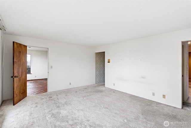 view of carpeted spare room