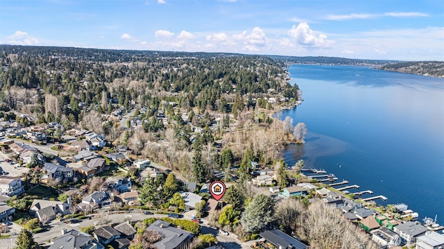 birds eye view of property featuring a residential view and a water view