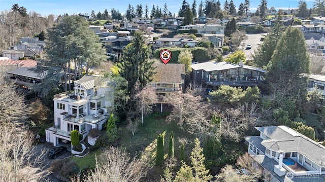 birds eye view of property with a residential view