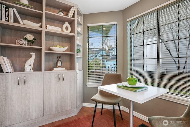 office with wood finished floors and baseboards