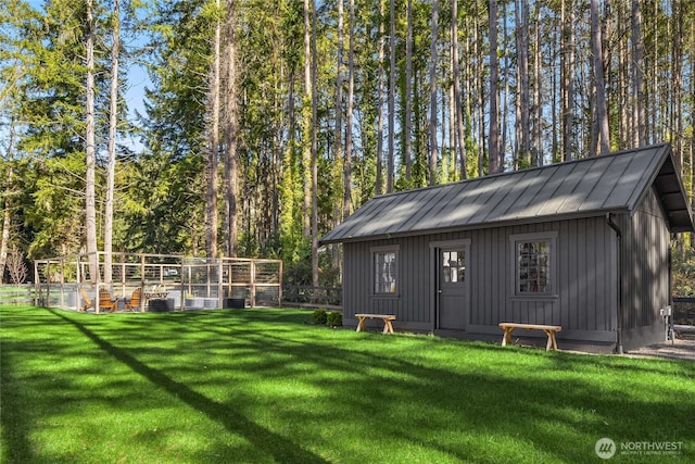 exterior space featuring an outbuilding