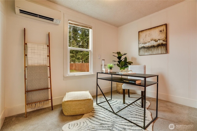 carpeted office with a textured ceiling, ornamental molding, and a wall mounted AC