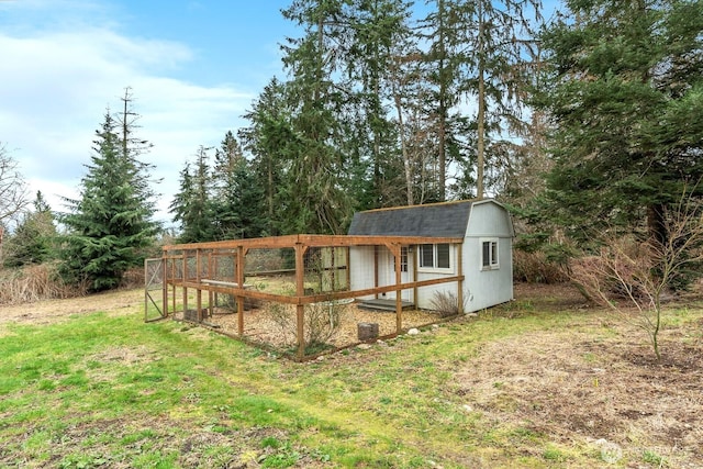 view of yard with exterior structure and an outdoor structure