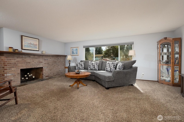 living area with a brick fireplace, carpet, and baseboards