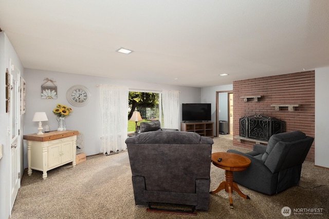 living area featuring a brick fireplace and light carpet