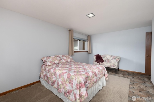 bedroom featuring baseboards