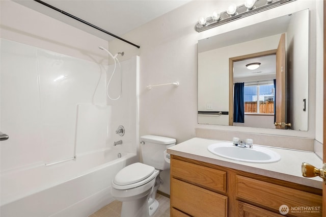 full bath featuring washtub / shower combination, toilet, and vanity