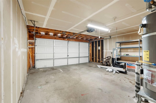 garage featuring secured water heater and a garage door opener