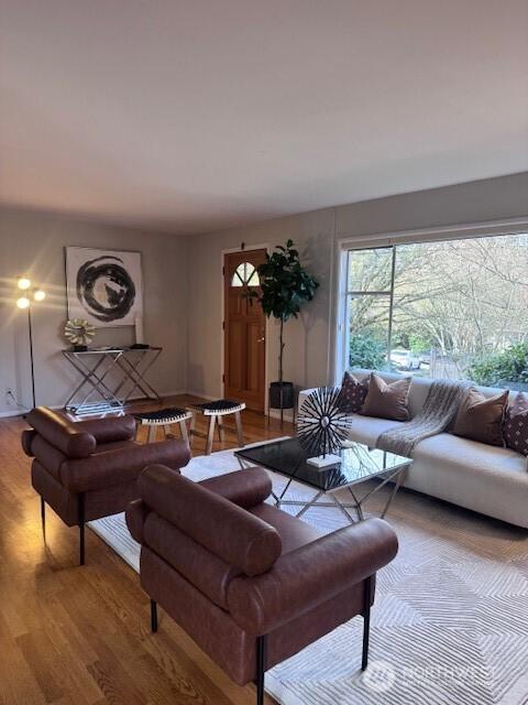 living area with wood finished floors