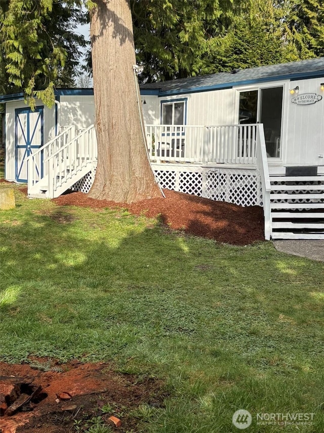 view of yard with an outbuilding and a storage shed