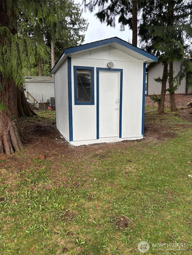 view of shed with cooling unit