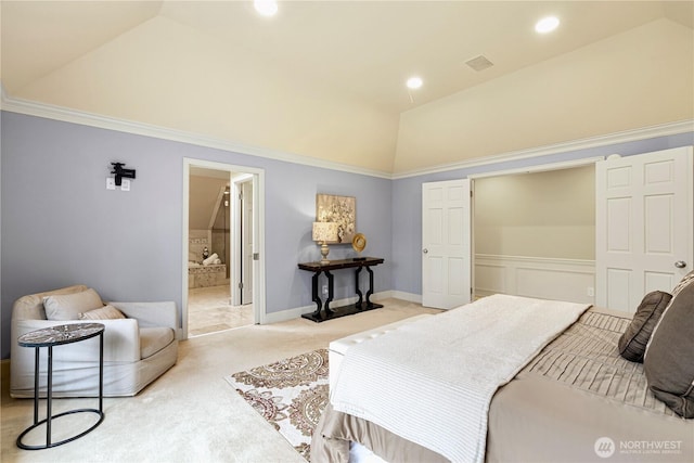 bedroom featuring light carpet, recessed lighting, ensuite bathroom, and lofted ceiling