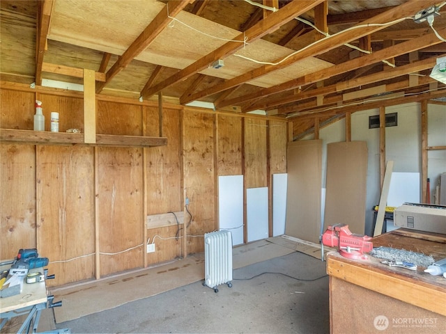 misc room with visible vents and radiator