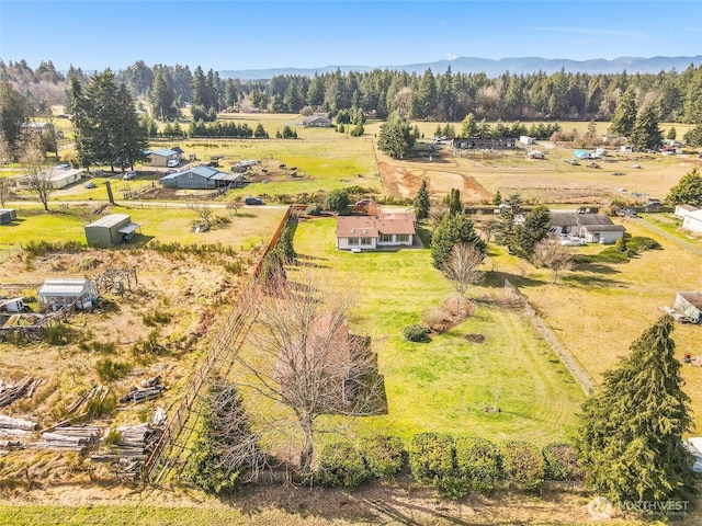 bird's eye view with a rural view and a mountain view