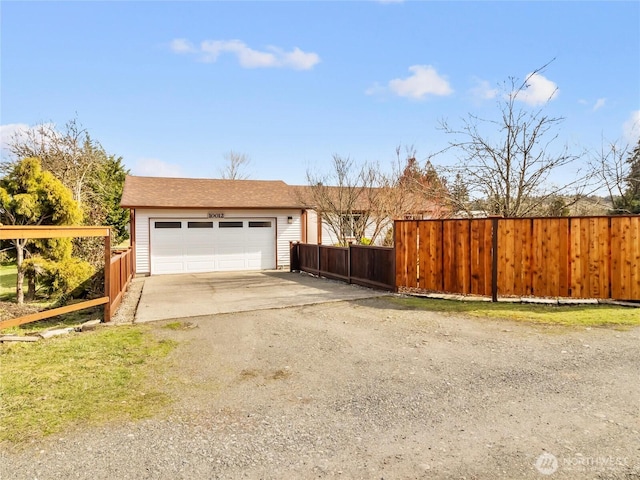 detached garage with fence