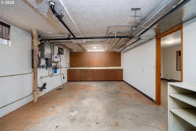 basement featuring electric panel
