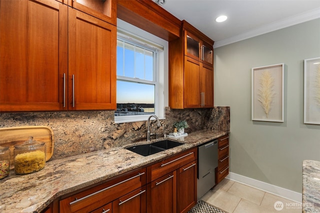 kitchen featuring light stone counters, light tile patterned floors, decorative backsplash, stainless steel dishwasher, and a sink