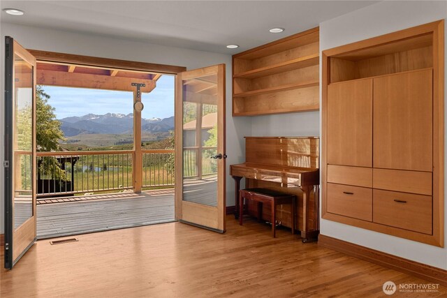 50 Sage Canyon Dr, Winthrop, WA 98862 - doorway with a mountain view, wood finished floors, and recessed lighting