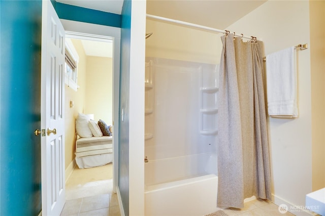 full bath with tile patterned floors, shower / bath combination with curtain, and baseboards