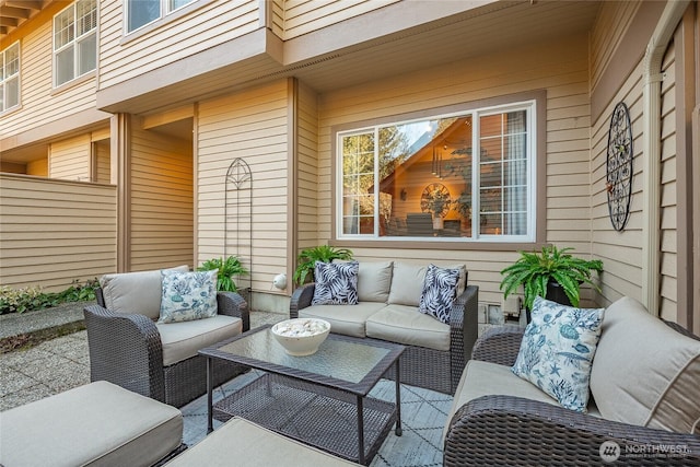 view of patio / terrace with an outdoor hangout area and fence