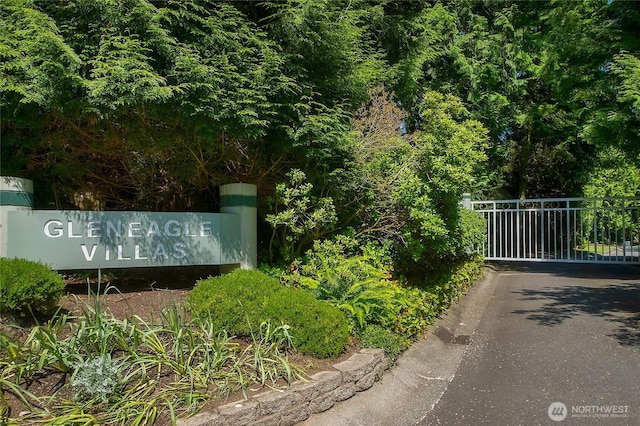 community sign with a gate