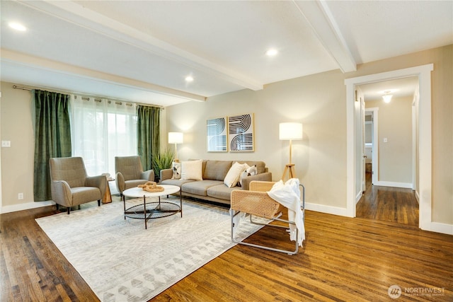 living area featuring recessed lighting, baseboards, beam ceiling, and wood finished floors