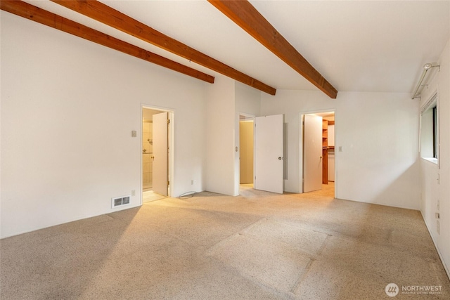 64 Garry Oak Ln, Friday Harbor, WA 98250 - interior space with beamed ceiling, light colored carpet, and visible vents