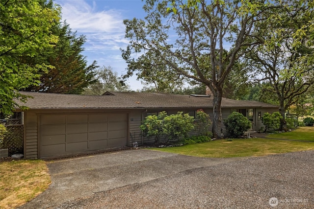 64 Garry Oak Ln, Friday Harbor, WA 98250 - ranch-style home with driveway, a front lawn, and a garage