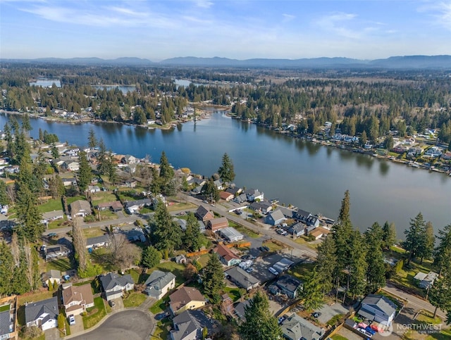 aerial view with a residential view and a water and mountain view