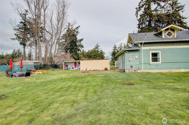 view of yard with fence